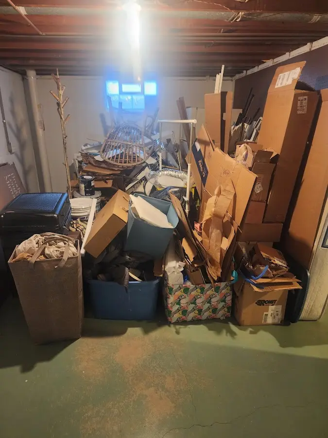 Roll-off dumpster container at job site for 2 Yard Dumpster Rental in Ellisburg